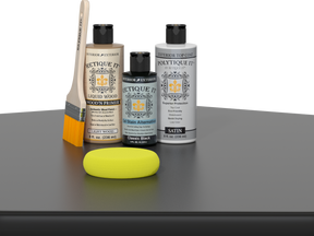 Retique It® Classic Black Brush-On Kit with Satin PolyTique® includes a brush, Light Wood primer, Classic Black Gel Stain Alternative, Satin PolyTique® top coat, and a yellow sponge.