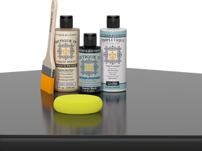 Retique It® Classic Black Brush-On Kit with Gloss TripleTique® includes a brush, Light Wood primer, Classic Black Gel Stain Alternative, Gloss TripleTique® top coat, and a yellow sponge.