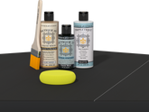 Retique It® Classic Black Brush-On Kit with Matte TripleTique® includes a brush, Light Wood primer, Classic Black Gel Stain Alternative, Matte TripleTique® top coat, and a yellow sponge.