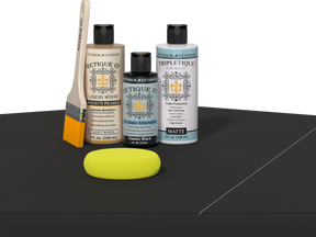 Retique It® Classic Black Brush-On Kit with Matte TripleTique® includes a brush, Light Wood primer, Classic Black Gel Stain Alternative, Matte TripleTique® top coat, and a yellow sponge.