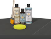 Retique It® Charcoal Brush-On Kit with Matte TripleTique® includes a brush, Light Wood primer, Charcoal Gel Stain Alternative, Matte TripleTique® top coat, and a yellow sponge.