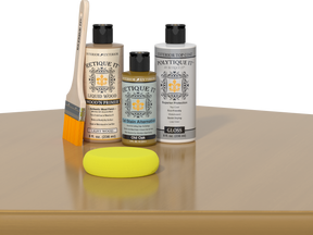 Retique It® Old Oak Brush-On Kit with Gloss PolyTique® includes a brush, Light Wood primer, Old Oak Gel Stain Alternative, Gloss PolyTique® top coat, and a yellow sponge.