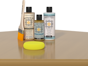 Retique It® Old Oak Brush-On Kit with Gloss TripleTique® includes a brush, Light Wood primer, Old Oak Gel Stain Alternative, Gloss TripleTique® top coat, and a yellow sponge.