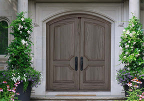 Retique It Wood'n Finish Kit in Harbor Gray for exterior wood, showing a grained door with a smooth gray top coat application.