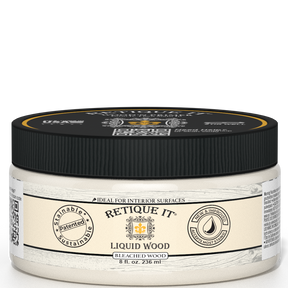 Retique It® Liquid Wood interior paint in 8oz bleached finish, shown in a jar with a smooth, wood-like texture.