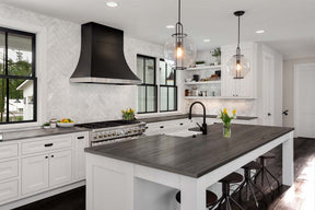 Retique It Wood'n Finish Kit in Harbor Gray for exterior wood surfaces, shown on a kitchen countertop with a textured grain finish.