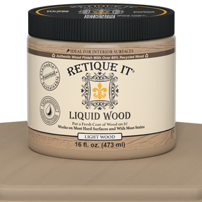 Retique It® Liquid Wood interior paint in 16oz Light color, showcasing a smooth wooden finish on a surface.