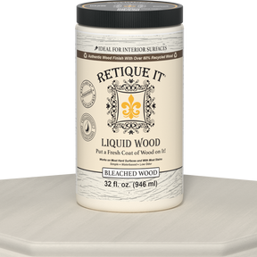 Liquid Wood 32oz Bleached interior paint by Retique It® showing a can of the wood finish with a bleached appearance and product label.