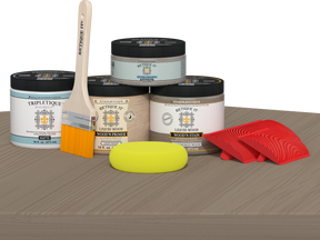 Retique It® Multi-purpose Wood'n Kit in Weathered Wood for interior top coat, showing a finished wood surface on a table.
