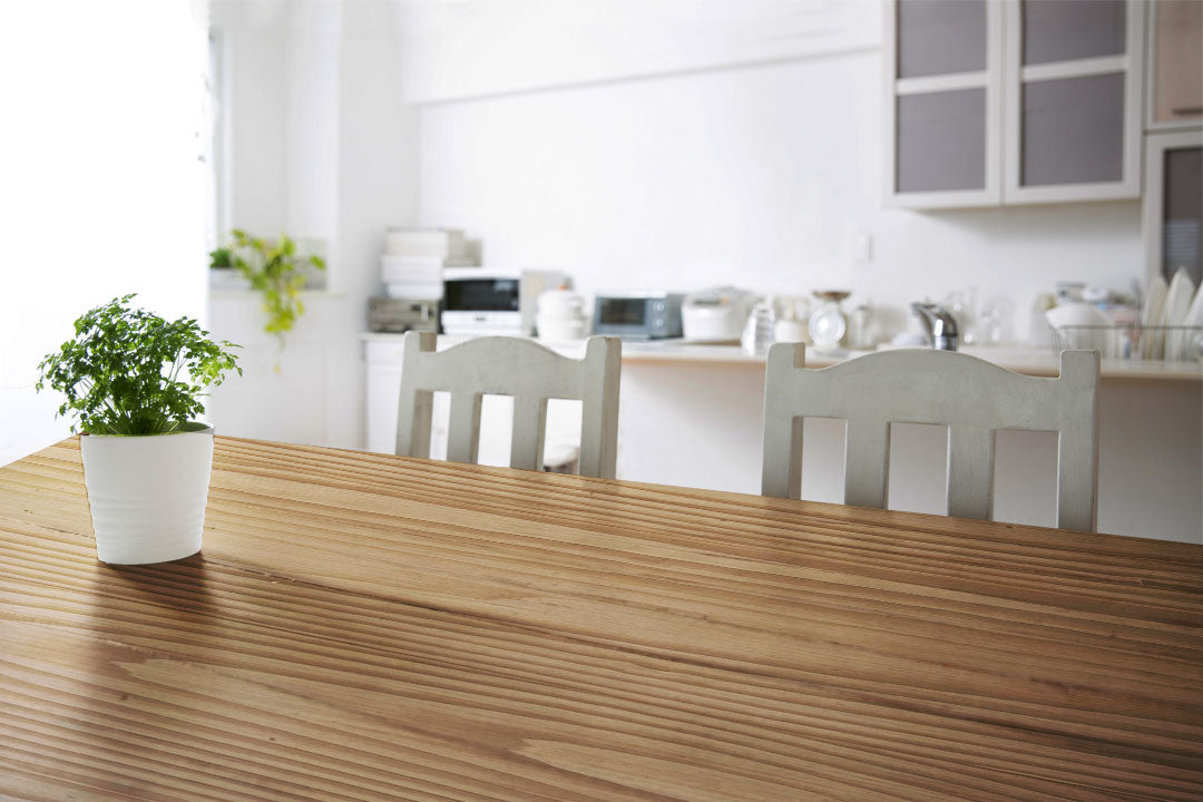 Dark wood Raw Wood Kit from Retique It® for wood finishing, shown on a textured tabletop with natural wood grain details.