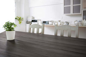Retique It Wood'n Finish Kit in Harbor Gray for exterior wood projects, showing a textured grained wood surface.