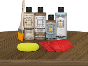 Retique It® Barn Wood Wood'n Kit with Light Wood primer, Barn Wood stain, Barn Wood gel stain alternative, Gloss Tripletique® Top Coat, brush, red graining tool, and yellow sponge.