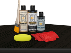 Retique It® Wood'n Kit Classic Black finish, multi-purpose wood finishing kit displayed on a table.
