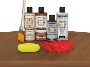 Retique It® Cedar Wood'n Kit with Satin TripleTique® includes a brush, Light Wood primer, Cedar stain, Pecan Gel Stain Alternative, Satin TripleTique® top coat, a yellow sponge, and a red graining tool.