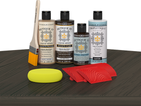 Retique It® Wood'n Finish Kit in Charcoal stain applied on a tabletop, showcasing a dark, smooth wood finish for furniture projects.