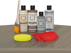 Retique It® Wood'n Finish Kit in Drift Wood with exterior top coat, displayed on a table for multi-purpose wood finishing.