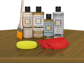 Retique ItÂ® Wood'n Finish Kit in Old Oak for exterior top coat, showing the kit components on a table.
