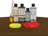 Retique It® Wood'n Finish Kit in Dark Pecan stain, showcasing the stain color and application on a tabletop surface.