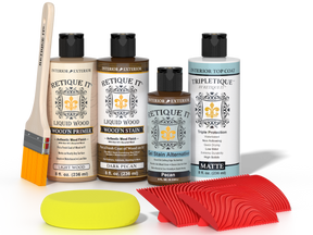 Retique It® Dark Pecan Wood'n Kit with Light Wood primer, Dark Pecan stain, Pecan gel stain alternative, Matte Tripletique® Top Coat, brush, red graining tool, and yellow sponge.
