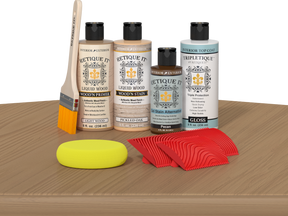 Retique It® Pickled Oak Wood'n Kit with Light Wood Primer, Pickled Oak Wood'n Stain, Gloss TripleTique Top Coat, Pecan Gel Stain Alternative, yellow sponge, red graining tool, and brush.