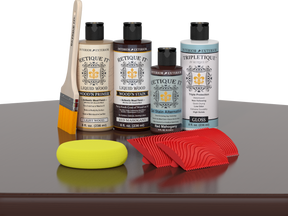 Retique It® Wood'n Finish Kit in Red Mahogany for interior top coat, shown on a table with wood surface.