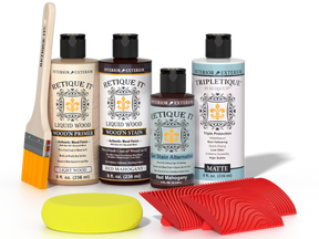 Retique It® Wood'n Finish Kit in Red Mahogany stain showing wood surface with applied stain and finishing tools.