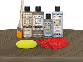 Retique It® Wood'n Finish Kit in Weathered Wood stain showing a tabletop with weathered wood finish and stain application.