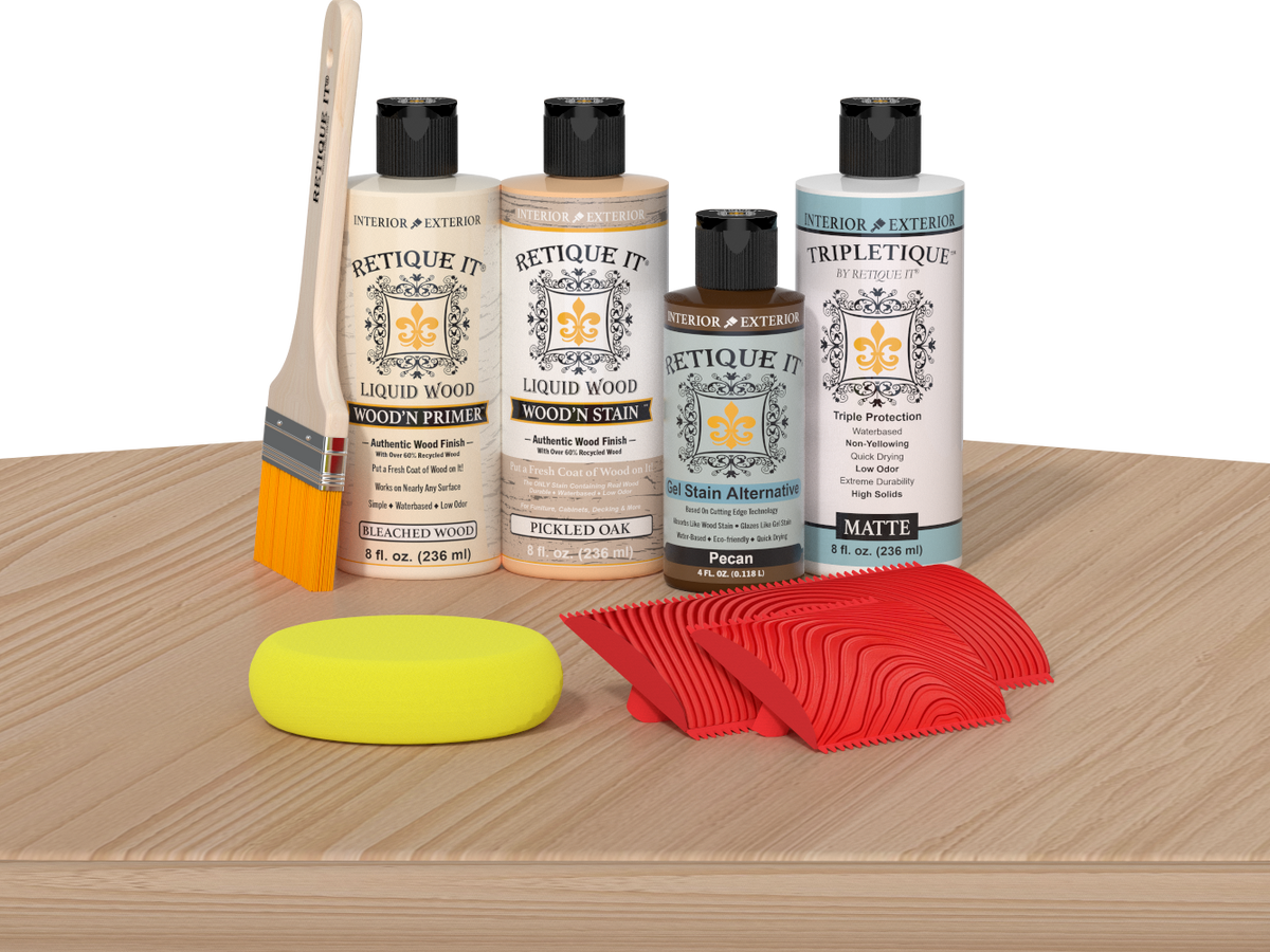 Retique It® Wood'n Finish Kit in White Oak stain displayed on a table, showcasing the stain's color and application on wood surface.