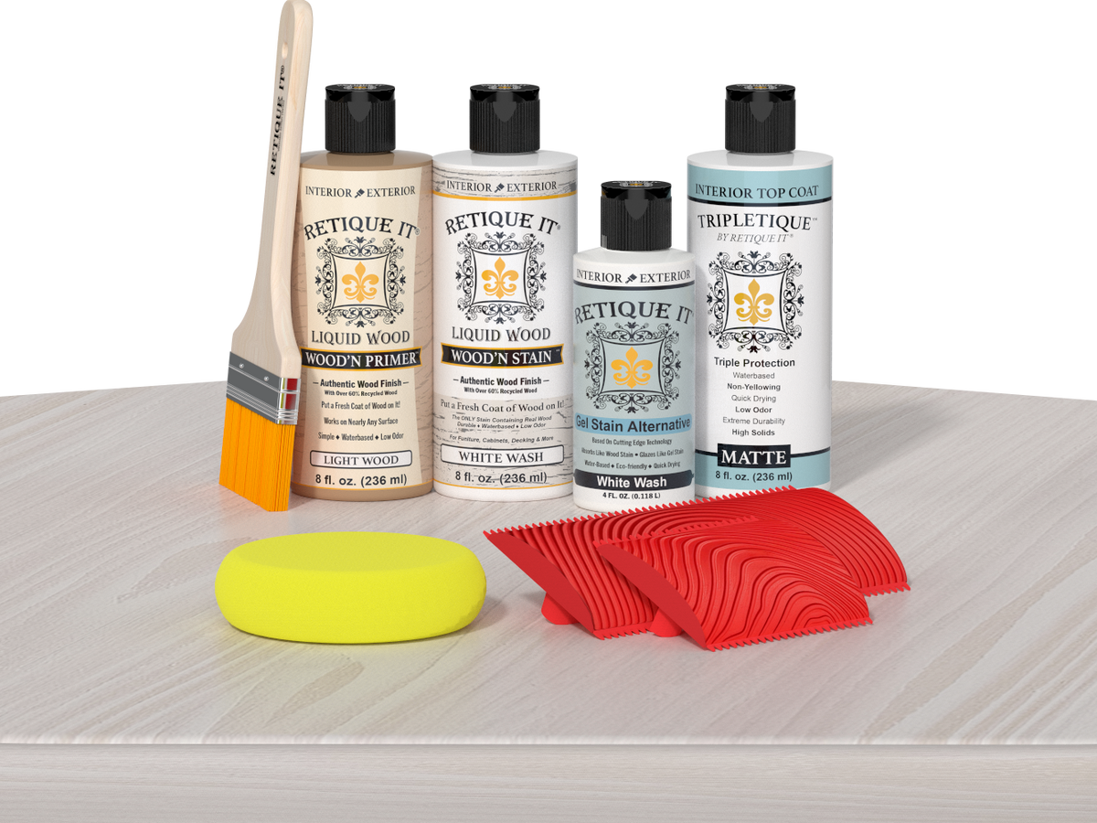 Retique It® White Wash Wood'n Kit with Light Wood primer, White Wash stain, White Wash gel stain alternative, Matte Tripletique® Top Coat, brush, red graining tool, and yellow sponge.
