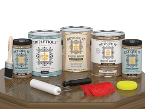 Retique It Wood'n Finish Kit with four large barn wood interior topcoats in glossy finish, shown on a table surface.