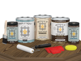 Black Walnut Wood'n Finish Kit by Retique It®, multi-purpose interior top coat set with four large containers on a table.