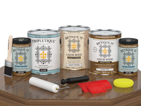 Glossy dark oak Wood'n Finish Kit by Retique It® with four large interior top coat bottles, shown on a wooden table.