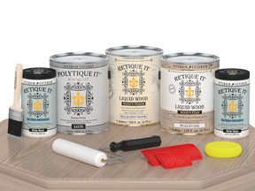 Sun-bleached Wood'n Kit exterior top coat by Retique It® with four large wood finish containers on a table in satin finish.