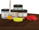 Retique It® Wood'n Finish Kit Double Size in Dark Oak stain displayed on a table, showing the stain's rich dark oak finish.