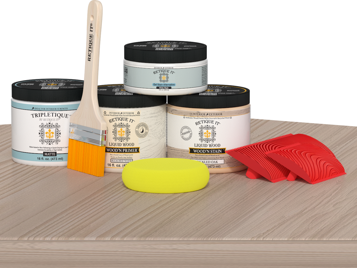 Sun-bleached Mid-sized Wood'n Finish Kit by Retique It® for interior top coating, featuring wood finish tools on a table.
