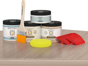 Retique It® Wood'n Finish Kit Double Size in Sun Bleached, tabletop with wood finish application and tools visible.