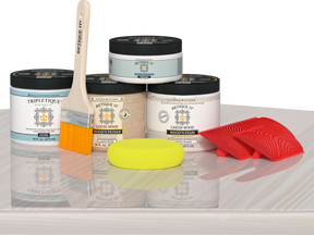 Retique It® Wood'n Finish Kit in White Wash for interior top coating, shown on table with wood sample and tools.
