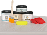 Retique It® Wood'n Finish Kit (Double Size) in White Wash stain on a table demonstrating the product application.