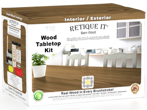 Retique It® Wood'n Finish Kit in barn wood stain with four large stain bottles on a tabletop.