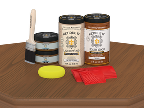 Retique It® Wood'n Cabinet Kit in cedar stain with 12 grained cabinet doors displayed on a table.