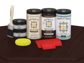 Retique It® Wood'n Finish Kit with four large red mahogany stain bottles, satin finish, displayed on a table.