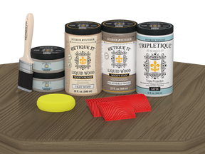 Retique It® Wood'n Finish Kit with four weathered wood stain bottles, satin finish, for tabletop furniture restoration.