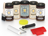 Retique It Red Mahogany Wood'n Kit featuring Red Mahogany Liquid Wood stain, Light Wood primer, Red Mahogany Gel Stain Alternative, paint brush, white roller, yellow sponge, and red graining tools.