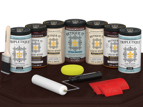 Retique It® Wood'n Cabinet Kit with 24 red mahogany stained cabinet doors, glossy finish, displayed on a table.