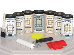 Retique It® Wood'n Cabinet Kit with white wash stain showing 24 grained cabinet doors in a satin finish on a table.