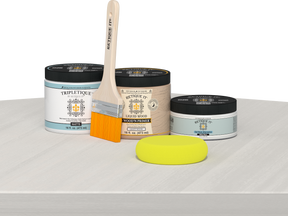 Retique It® Multi-purpose Smooth Finish Kit (Med) in White Wash for interior wood surfaces, featuring a matte top coat on a table.