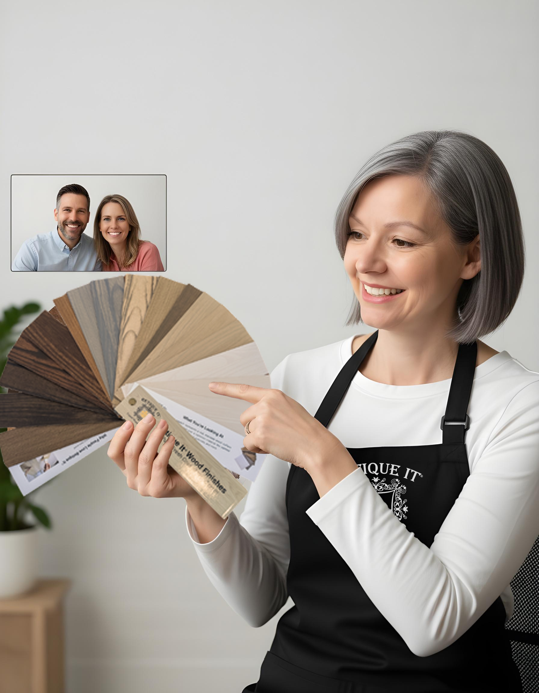 Jessica on a video call demonstrating a Retique It® professional finish technique with a fan deck for digital styling guidance.